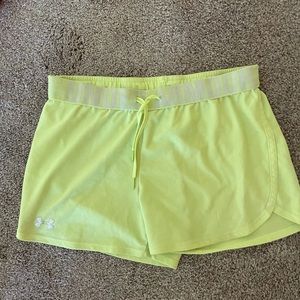 Yellow Under Armor running shorts